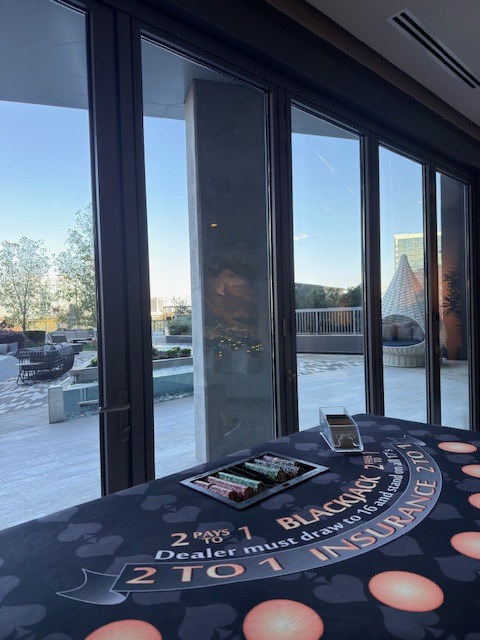 blackjack-table-rental-floor-to-ceiling-windows - The Main Event Company Blackjack table positioned beside floor-to-ceiling windows