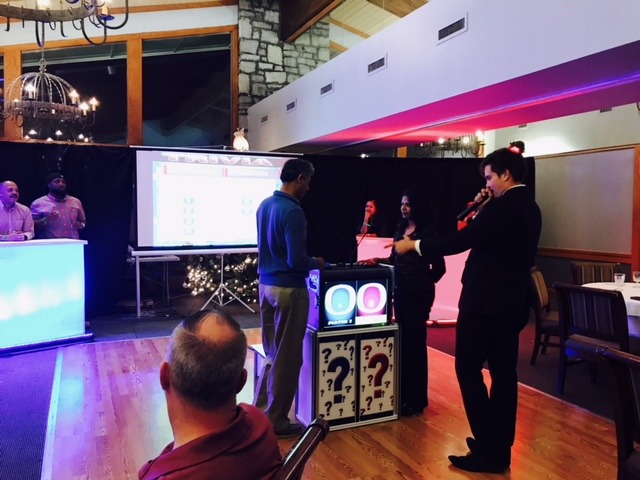 interactive-game-show-host-podium - The Main Event Company Game show host beside a contestant podium
